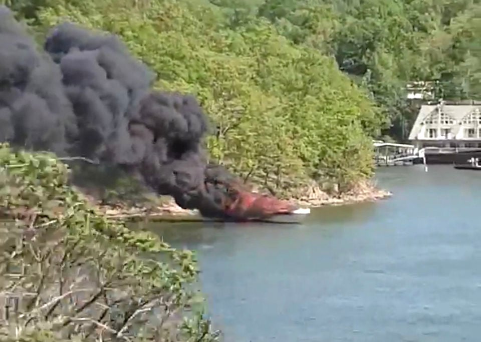 Boat On Fire Near Grand Glaize Bridge